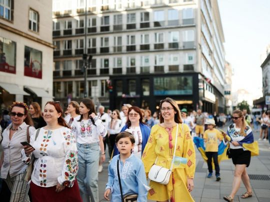 Українські біженці воліють оселитися в Австрії, а не в Польщі: стали відомі причини