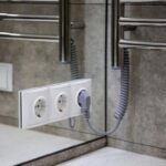 Тепло и безопасно: как выбрать и установить отопительные приборы и розетки в ванной